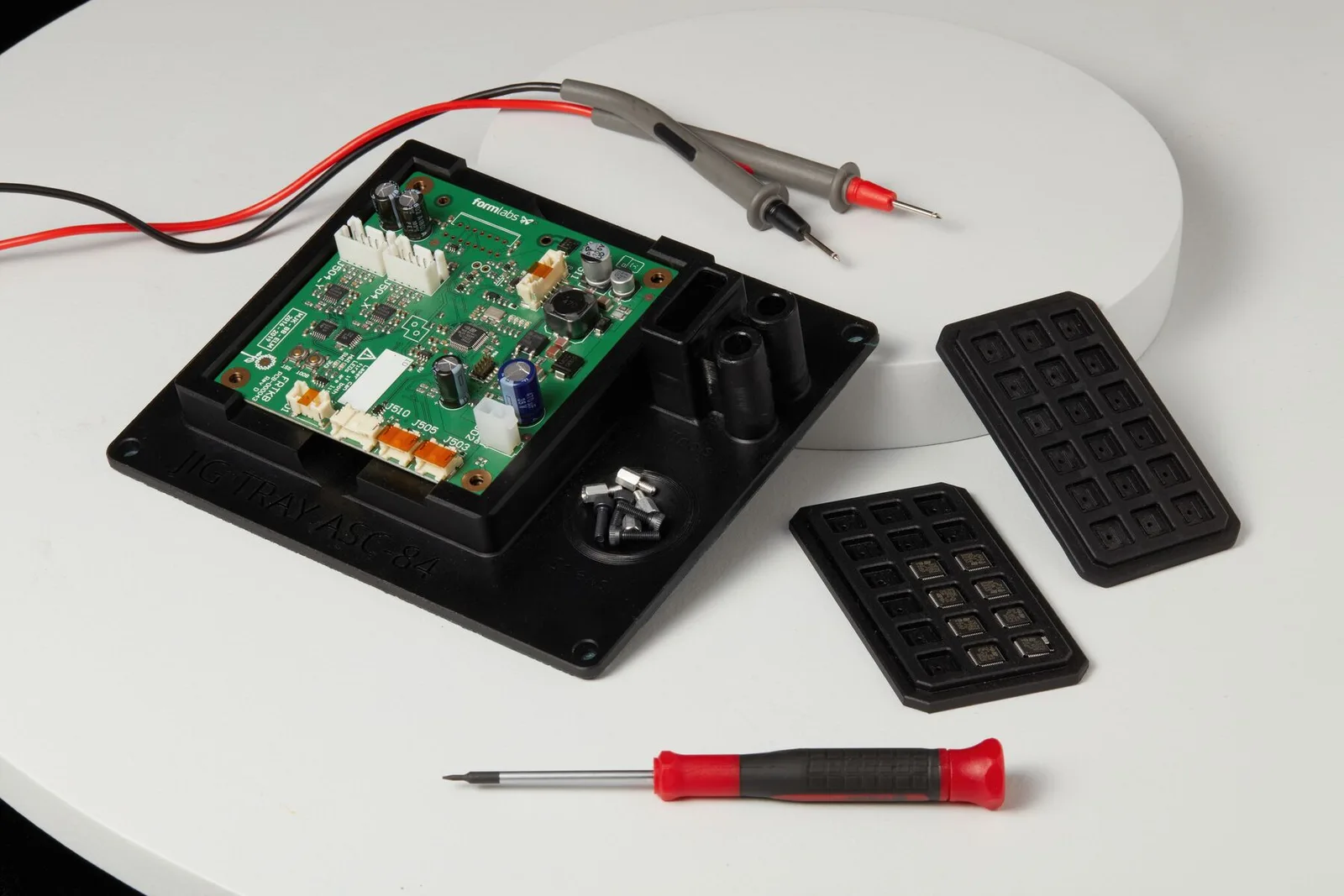 Electronics manufacturing assembly jig printed with ESD safe specialty resin